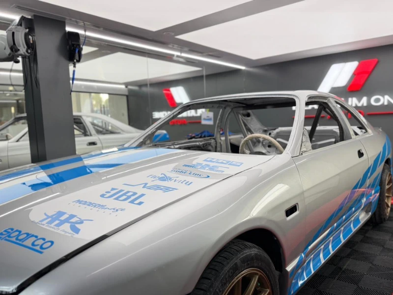 Nissan Skyline after partial wrap and sponsor decal install, 2 Fast 2 Furious-inspired finish at Platinum One Auto, Dubai